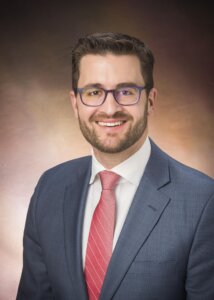 Headshot of Dr. Gregory Tasian